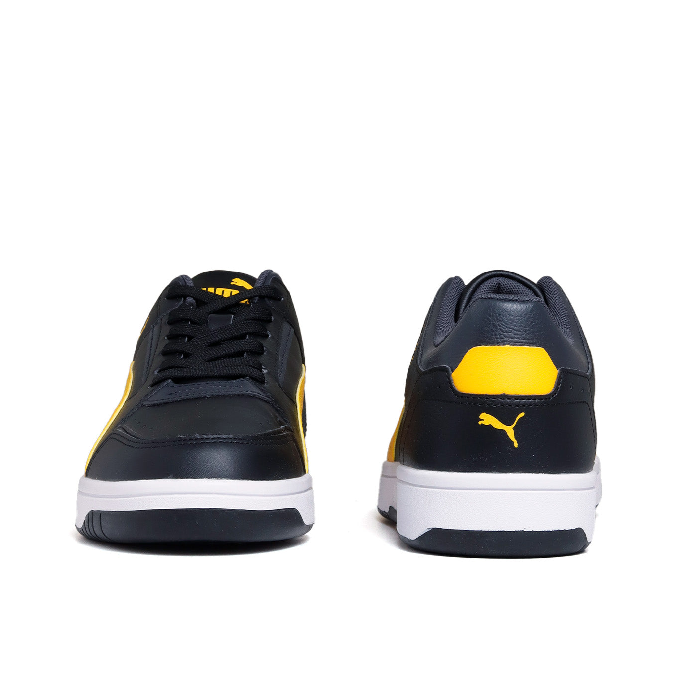 Puma negro outlet con amarillo